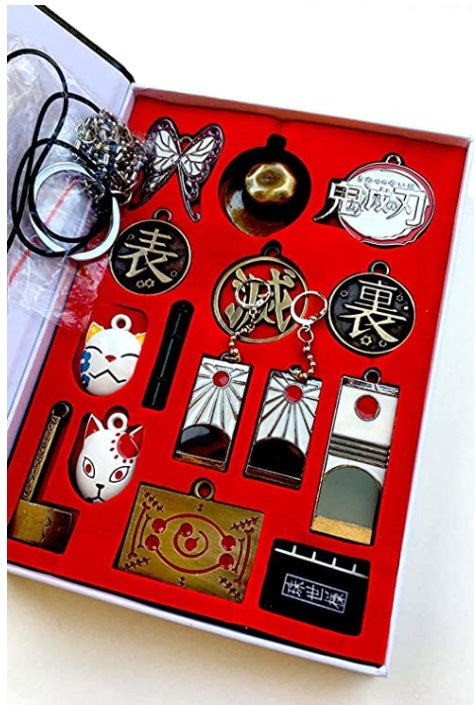 Demon Slayer - Kimetsu no Yaiba box collection of pendants and earrings مجموعة ميداليات وقلادات قاتل الشياطين.